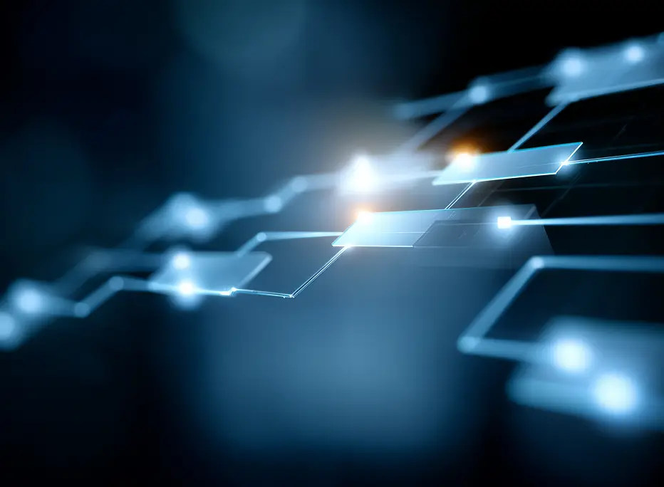 A blurred, futuristic network of glowing interconnected rectangular nodes floating in a dark blue space, resembling a digital or technological data pathway.