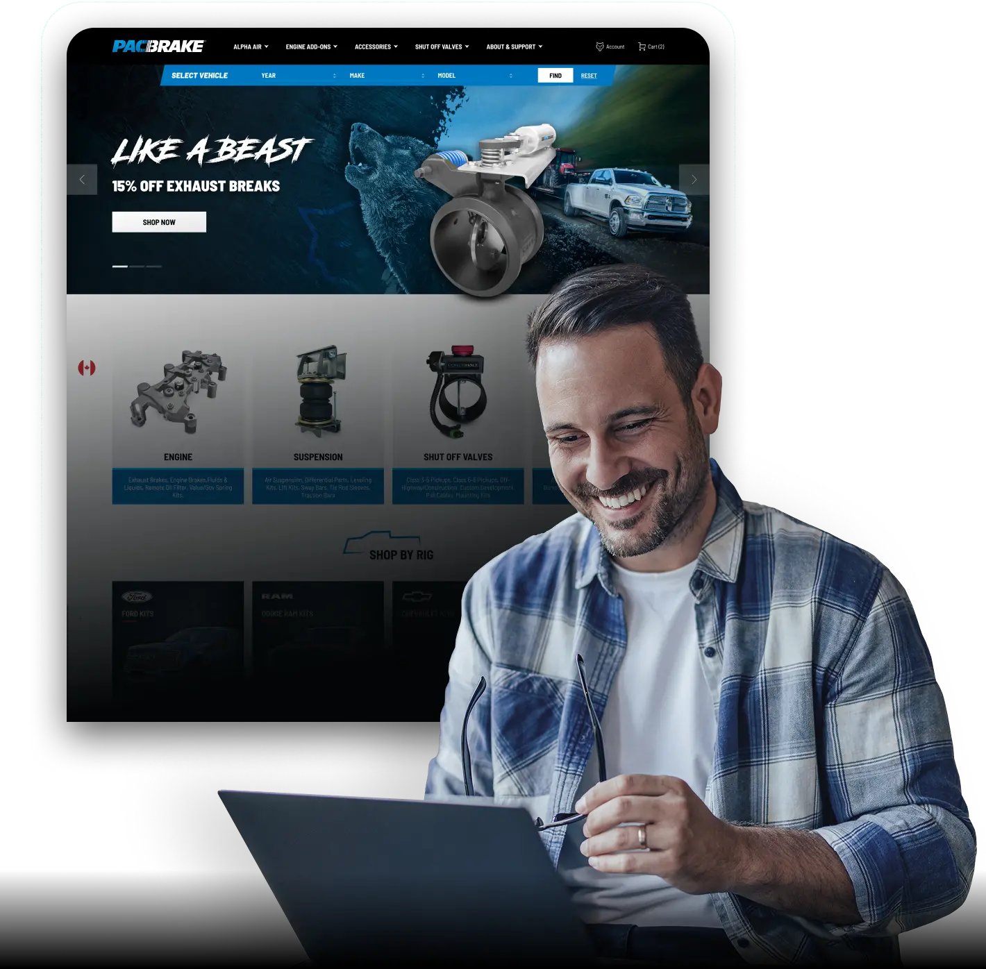A smiling man in a plaid shirt works on a laptop in the foreground, while behind him a large website interface for Pacbrake is displayed, featuring automotive parts, a promotional banner with a truck and exhaust brake, and product categories such as engine components, suspension, and shut-off valves.