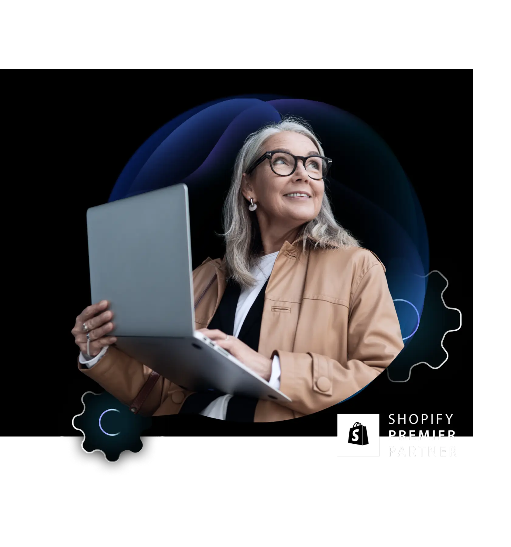 <p>An older woman wearing glasses and a beige jacket holding and using a laptop, with decorative gear graphics in the background and a Shopify Premier Partner logo displayed.</p>