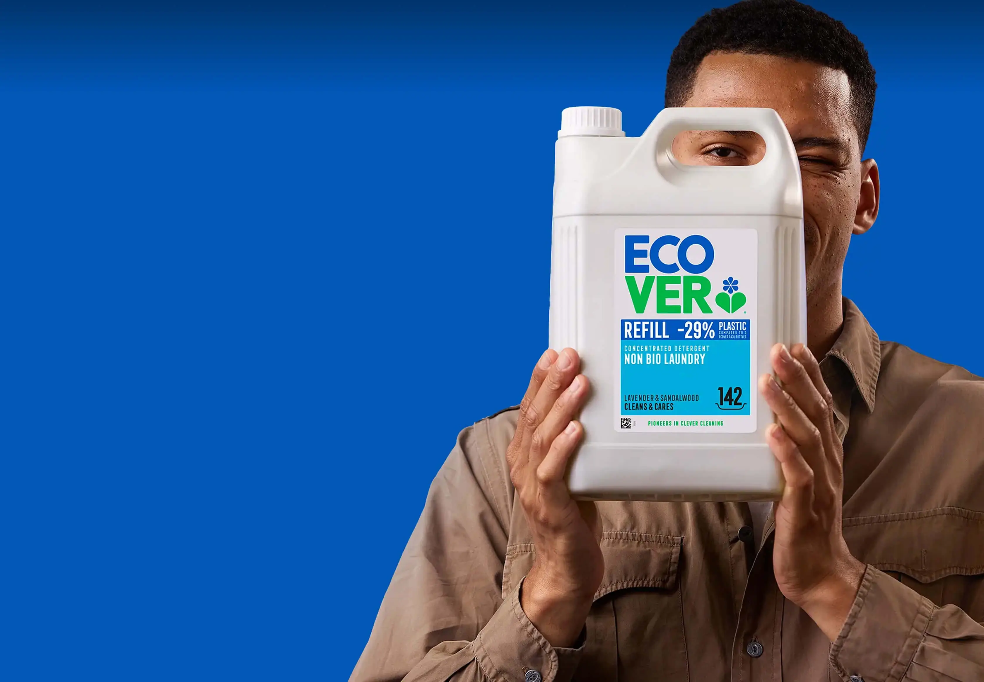 man holding an ecover bottle