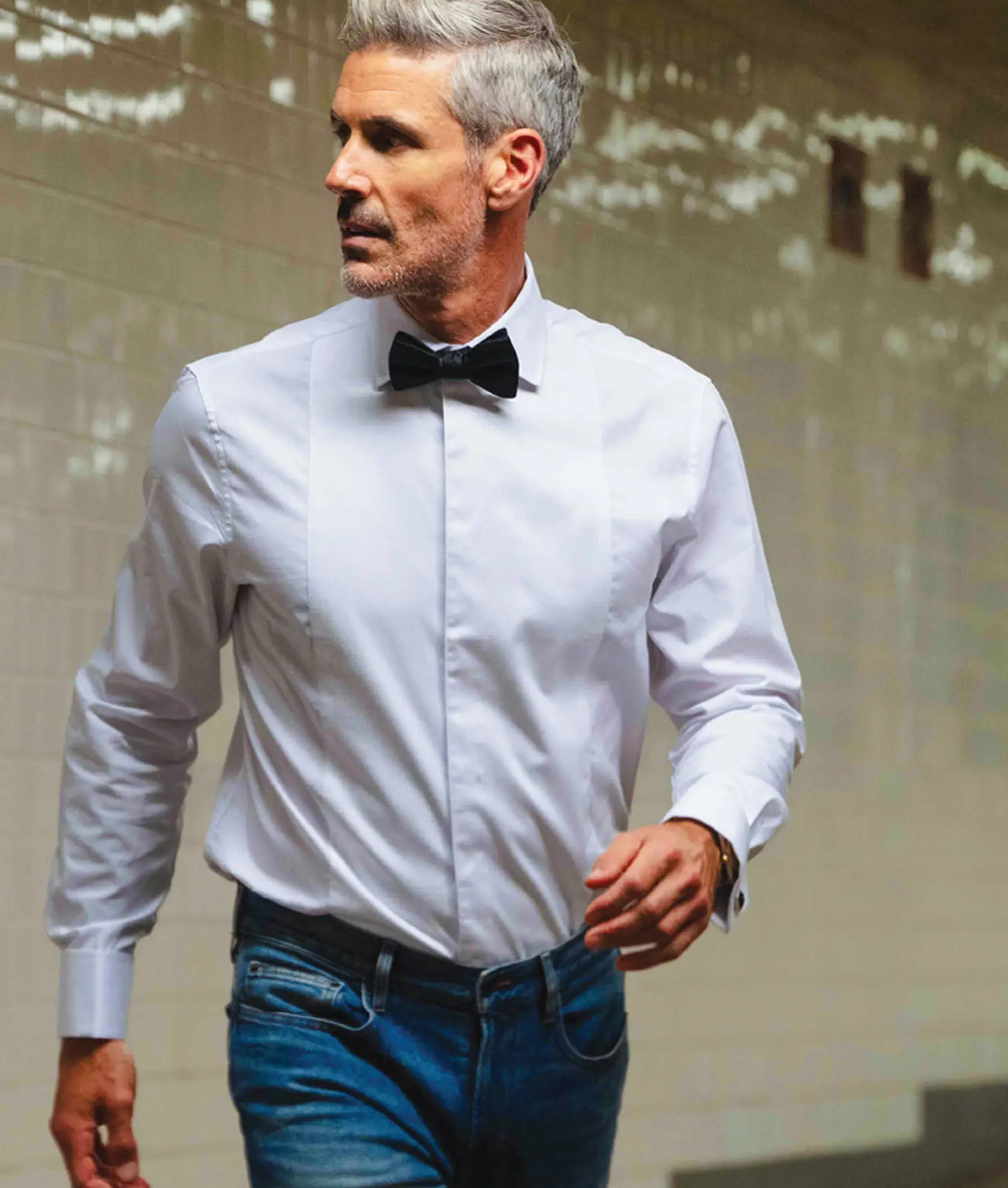 man wearing a white Nick Graham shirt